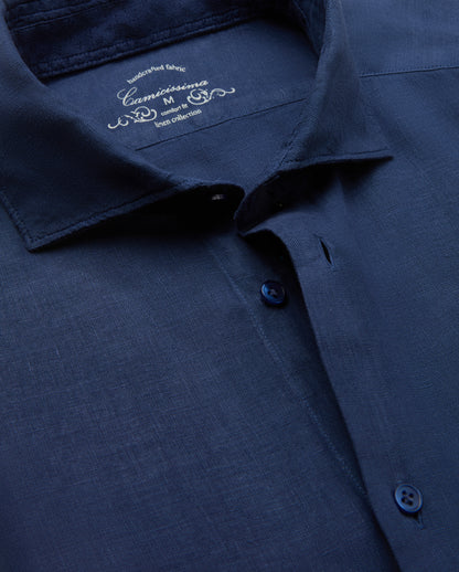 Navy blue shirt with brand logo on collar