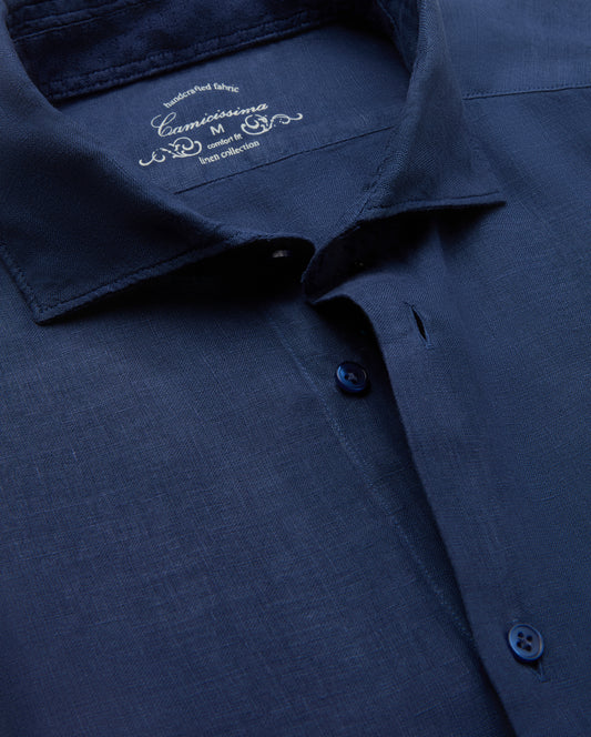 Navy blue shirt with brand logo on collar